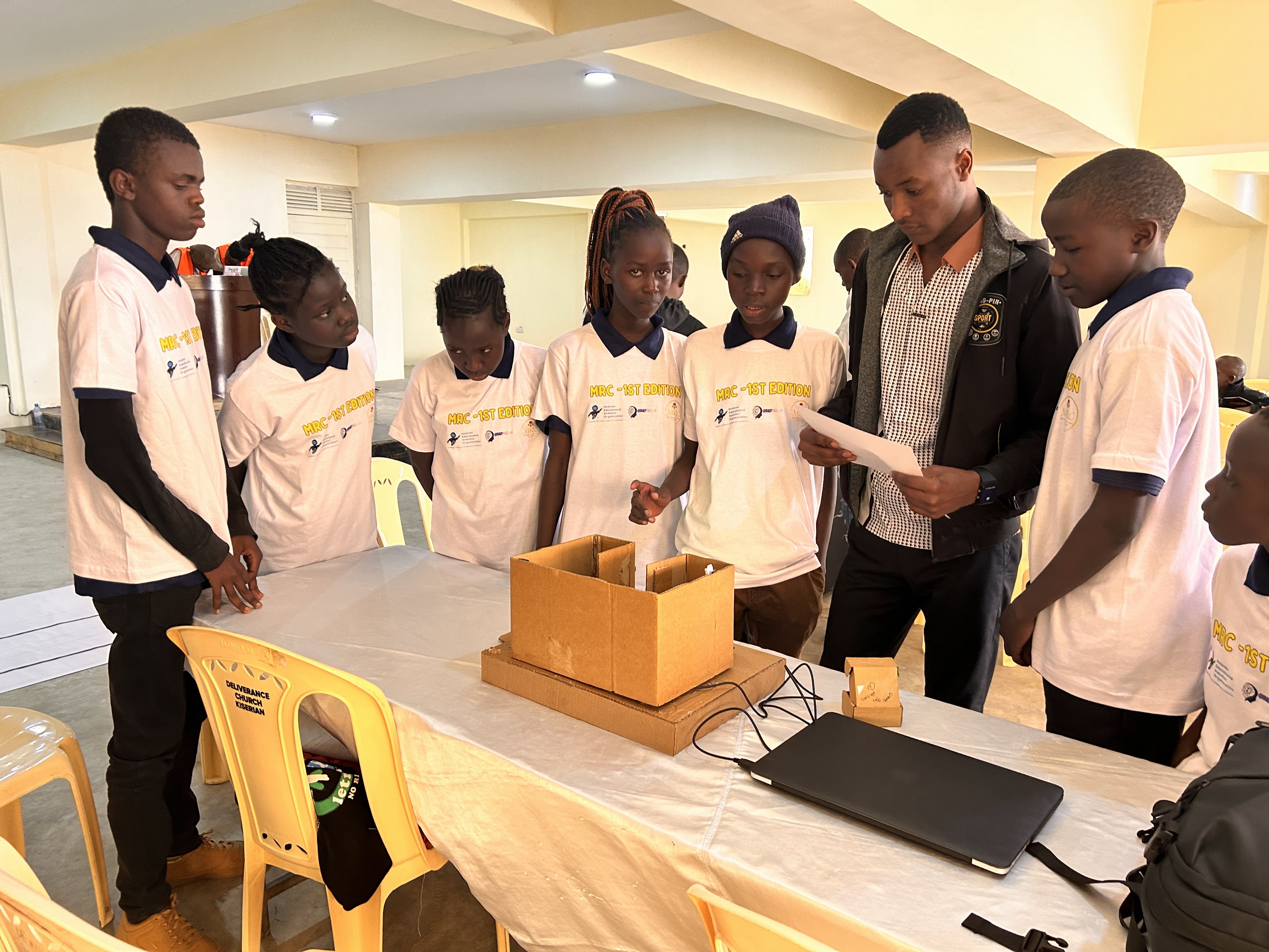 MRC Kenya students presenting a robotics project