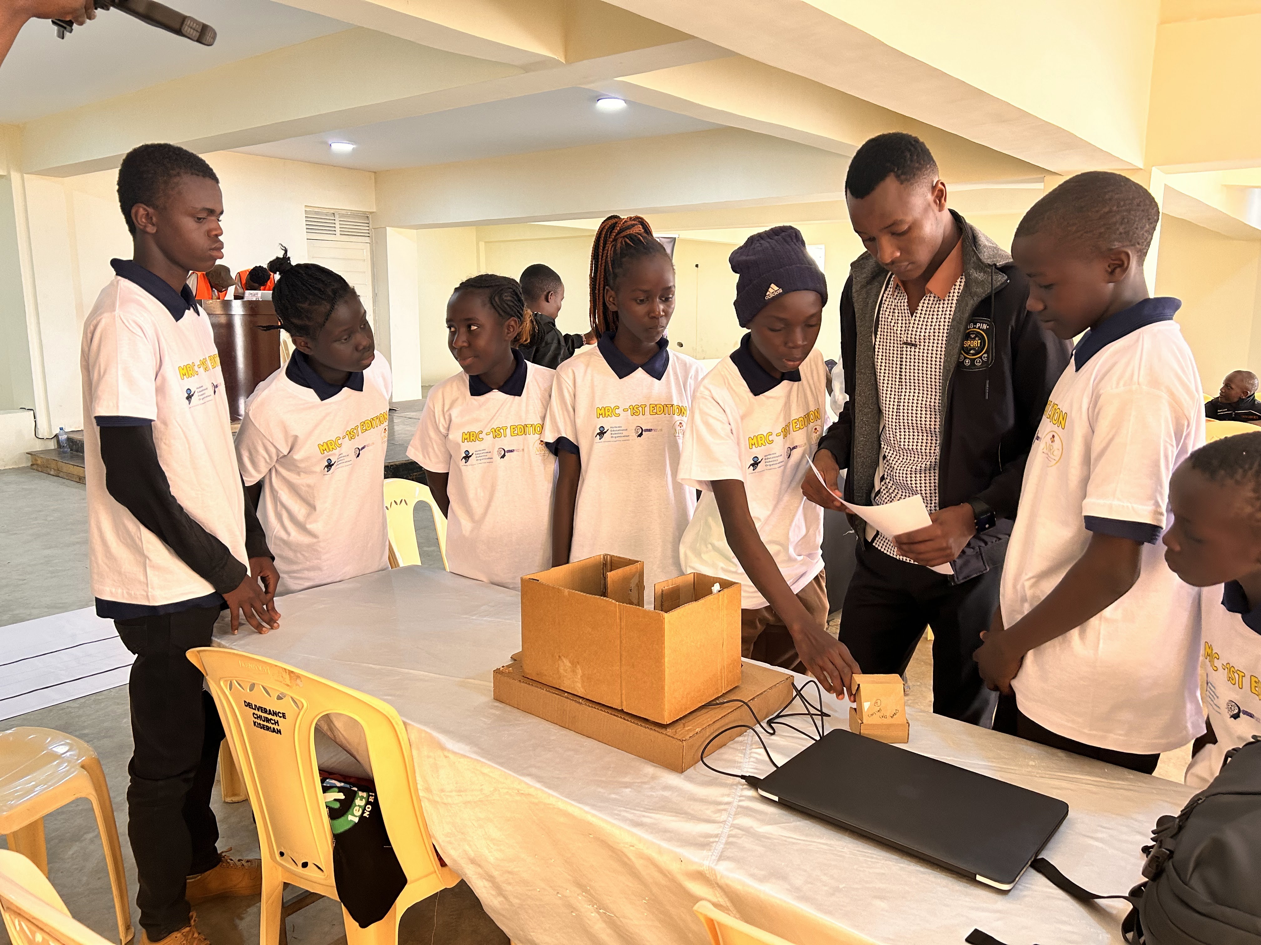 Young innovators explaining their project at MRC Kenya 2026