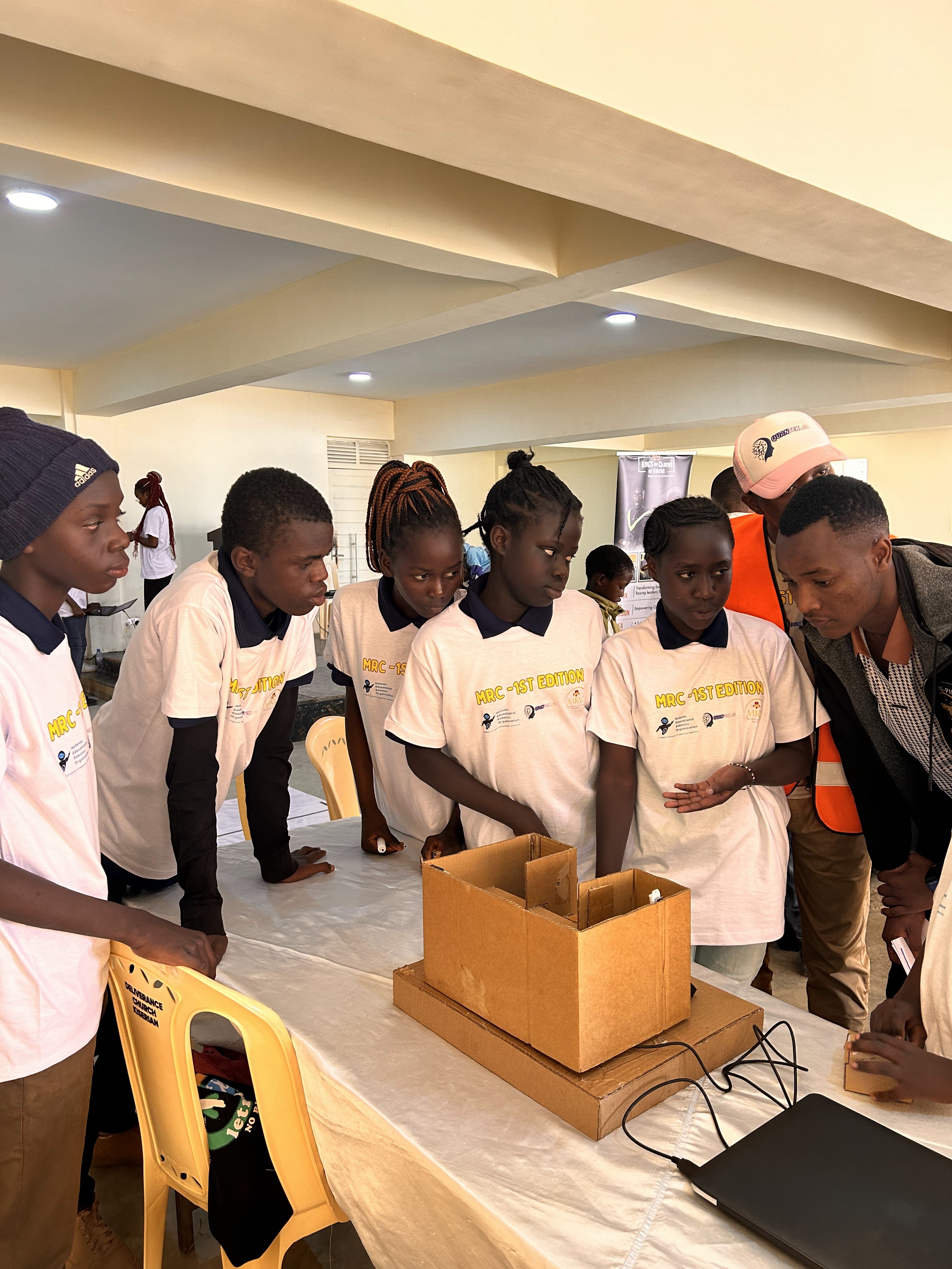 Students cheering during a robotics competition round