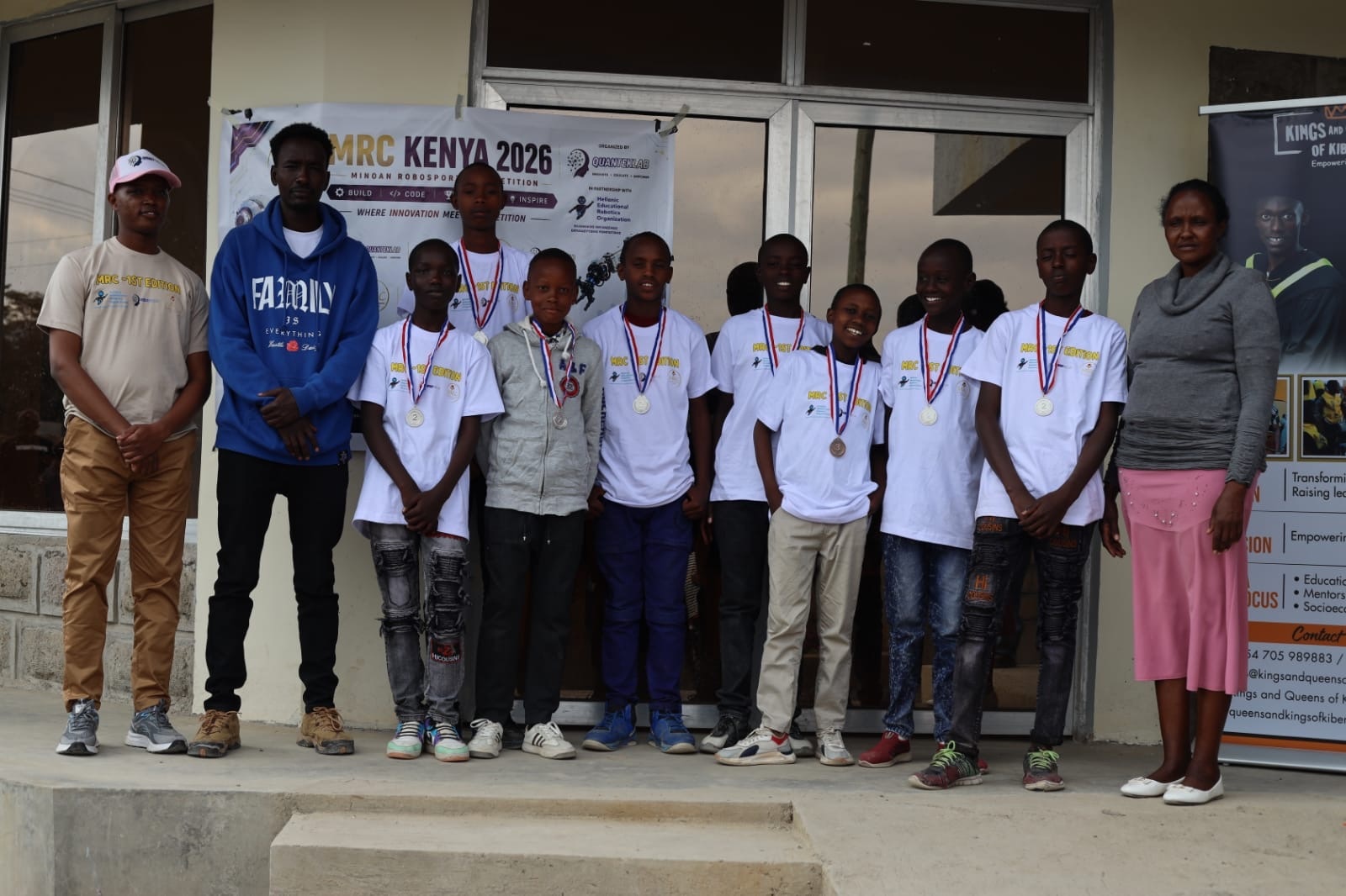 MRC Kenya participants wearing medals in a full team photograph